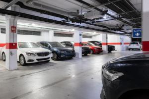a parking garage with cars parked in it at ibis Styles Santander in Santander
