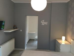 Kúpeľňa v ubytovaní Happy Mammy Bababarát Apartmanház 1 - Hűvös utca