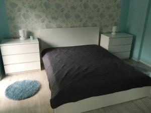 Posteľ alebo postele v izbe v ubytovaní Happy Mammy Bababarát Apartmanház 1 - Hűvös utca