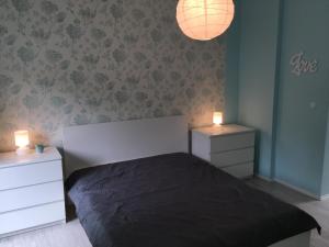 Posteľ alebo postele v izbe v ubytovaní Happy Mammy Bababarát Apartmanház 1 - Hűvös utca