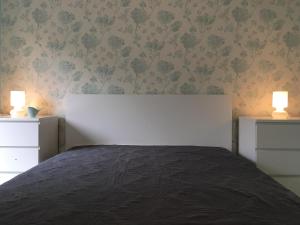 Posteľ alebo postele v izbe v ubytovaní Happy Mammy Bababarát Apartmanház 1 - Hűvös utca