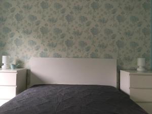 Posteľ alebo postele v izbe v ubytovaní Happy Mammy Bababarát Apartmanház 1 - Hűvös utca
