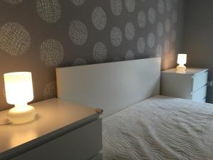 Posteľ alebo postele v izbe v ubytovaní Happy Mammy Bababarát Apartmanház 1 - Hűvös utca
