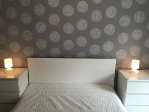 Posteľ alebo postele v izbe v ubytovaní Happy Mammy Bababarát Apartmanház 1 - Hűvös utca
