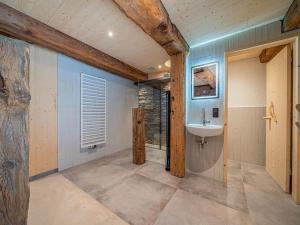 a bathroom with a sink and a shower at Raneburg 4 Stallhaus in Matrei in Osttirol