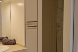 Ένα μπάνιο στο Inselblume 23 - Ferienwohnung mit 2 Balkonen und Meerblick +16 φωτογραφίες