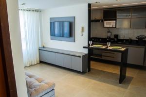 Køkken eller tekøkken på Residencial Jardins do Atlântico