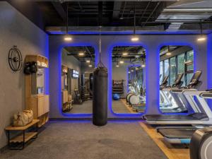 a gym with a punching bag in the middle at Novotel Mexico City World Trade Center in Mexico City