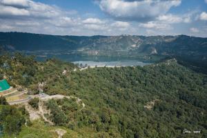 an aerial view of a lake in the mountains at Wenchi Eco-lodge in Dirē Kʼalu