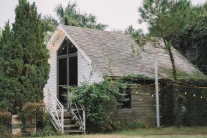 a house with a staircase leading to a door at V-Eco Nest in Thạch Cầu