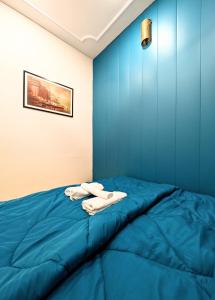 Postel nebo postele na pokoji v ubytování Hidden Monkey Hostel, Chet Singh Ghat, Varanasi