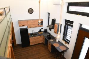 an overhead view of a kitchen with a sink at Kocohouse Casa vacanze in Marino