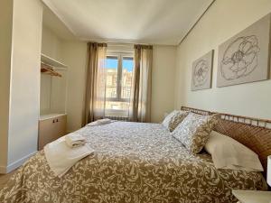 Postel nebo postele na pokoji v ubytování Espacios Blanco Santiago