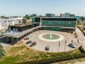 an aerial view of a building with a fountain at Mercure Tallinn in Tallinn