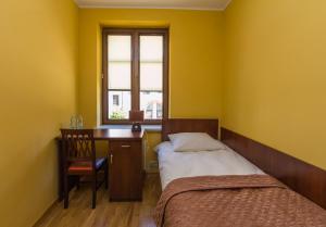 Ένα ή περισσότερα κρεβάτια σε δωμάτιο στο Apartament Stare Miasto 1