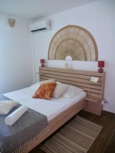 Postel nebo postele na pokoji v ubytování Solea, appartement proche plage privée