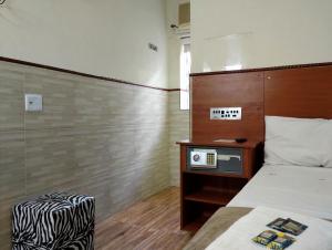 Postel nebo postele na pokoji v ubytování Hotel Brooklin