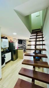 Køkken eller tekøkken på Recreio Beach - Suítes - Quarto Família e Quarto coletivo na Gilka Machado