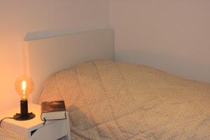 Ένα ή περισσότερα κρεβάτια σε δωμάτιο στο Ferienwohnung Ferdinand