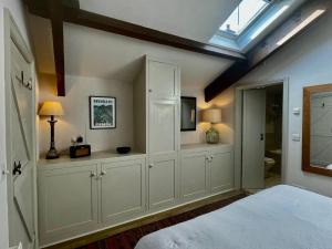 a bedroom with a bed and a skylight at 1 Bed in Ullswater 94066 in Watermillock