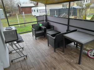 Posezení v ubytování Ház a tónál szelid