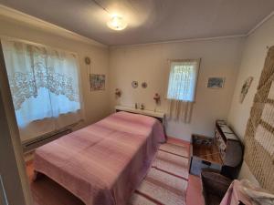 Postel nebo postele na pokoji v ubytování Kåfjord aurora northern light