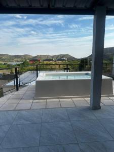 Bazén v ubytování Cabañas Altos del Cerro Potrero de los Funes con vistas a las Sierras nebo v jeho okolí