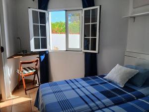 Ένα ή περισσότερα κρεβάτια σε δωμάτιο στο Casa Vista Verde