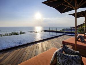 a view of the ocean from a villa at Tribe Bali Kuta Beach in Kuta