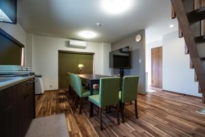 a kitchen and dining room with a table and chairs at MusicInn Matoya - Vacation STAY 62103v in Sumoto