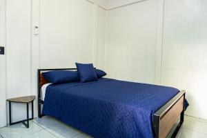 Ένα ή περισσότερα κρεβάτια σε δωμάτιο στο Deer Apartments Bahía Ballena