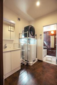 a bathroom with a sink and a toilet in a room at Miyakojima - House - Vacation STAY 20446 in Hirara