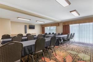 a conference room with a long table and chairs at Best Western Plus Garden Court Inn in Fremont +47 photos