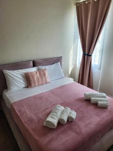 En eller flere senge i et værelse på Villa Gallo Luxury Colli Euganei