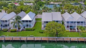an aerial view of houses on the water at Village at Hawks Cay Villas by KeysCaribbean in Marathon