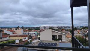 a view of a city with solar panels on the roof at Flats containers in Rio Verde