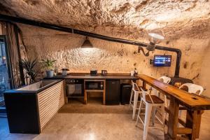 Η κουζίνα ή μικρή κουζίνα στο Le Cavernacle +13 φωτογραφίες