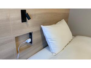 Giường trong phòng chung tại Smile Hotel Osaka Nakanoshima - Vacation STAY 70582v +60 ảnh