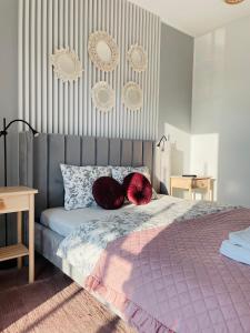 Katil atau katil-katil dalam bilik di Apartament w Słupsku z klimatyzacją balkonem parkingiem