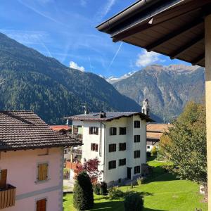 a view of the mountains from a building at Harmonia Suite & Apartments in Giustino