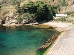 an aerial view of a beach with a body of water at umieru - Vacation STAY 50097v in Taiza
