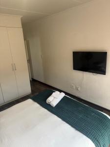 Ένα ή περισσότερα κρεβάτια σε δωμάτιο στο Candymore apartment +6 φωτογραφίες