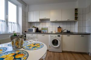 Una cocina o cocineta en Piatra Craiului Cozy Flat