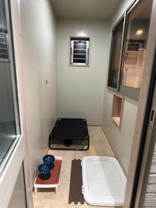 a small room with a bed and a mattress at Plaisir Kumamoto - Vacation STAY 20334 in Hanabatachō +22 photos