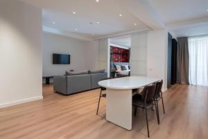 TV a/nebo společenská místnost v ubytování Artifact Apart Hotel + 76 fotografií