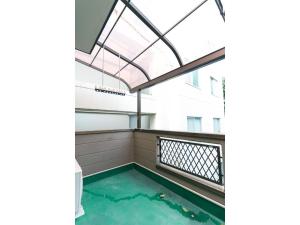 Bazén v ubytování Mirai Stay Tsuboi - Vacation STAY 54038v nebo v jeho okolí