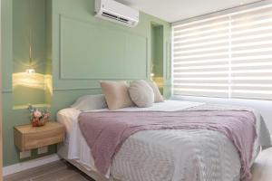 Postel nebo postele na pokoji v ubytování Exclusive Luxury Apartment - Poblado Medellín