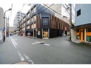 an empty street in a city with buildings at HOTEL ALL IN Kumamoto - Vacation STAY 55141v in Hanabatachō