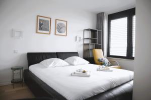 Postel nebo postele na pokoji v ubytování Beautiful Exclusive Studio in Cloche d'Or