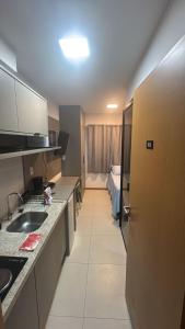 Kuchyň nebo kuchyňský kout v ubytování Studio Novo Próximo a Praia